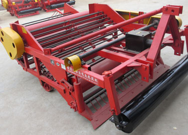 Drum type peanut harvesting machine